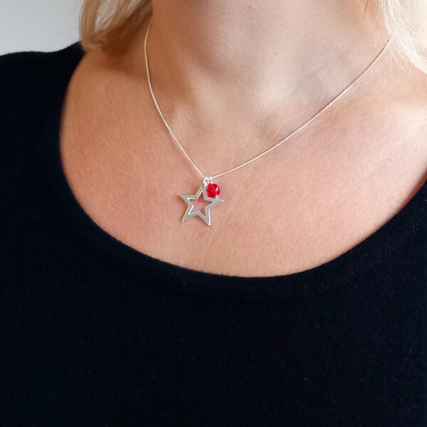 Silver star and red tiffany bead pendant