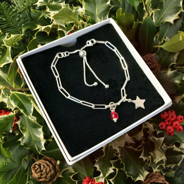 paperclip bracelet with red quartz bead and star